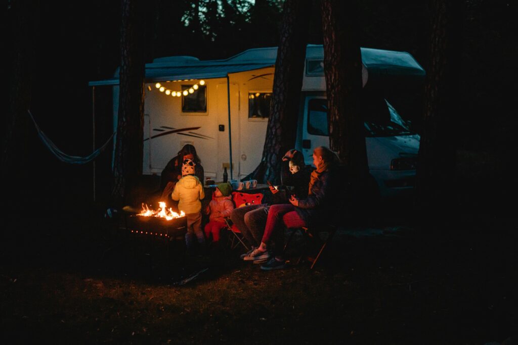 Family Law in Somalia: What You Need to Know Family enjoying a warm night by the campfire beside their campervan in Lithuania.